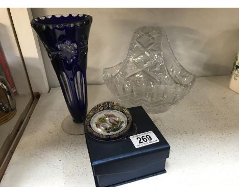 A blue glass vase, cut glass basket and a commemorative paperweight