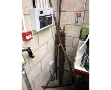 A quantity of vintage tools including syth, aw etc.