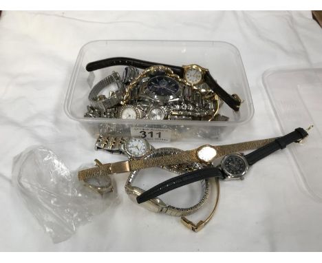 A box of assorted watches (8 in working order) including Timex, Limit, Accurist, Lorus etc.