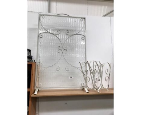 A matching retro firescreen and magazine rack