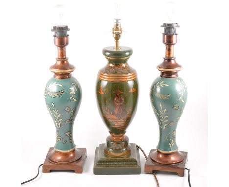 A painted chinoiserie style table lamp, 41cm; and a pair of vase shape painted table lamps.