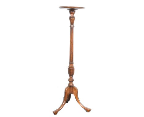Reproduction walnut and stained beech torchere, turned and fluted tapering column, tripod base, diameter 29cm, height 110cm.