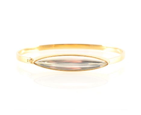Lalique - a gold-plated bangle from the Eclat collection, polished clear lozenge shape crystal, underside marked Lalique, pre