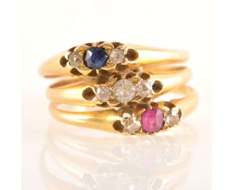 Three joined dress rings, set with sapphires, diamonds and rubies, each a three stone ring, one hallmarked Birmingham 1893, g