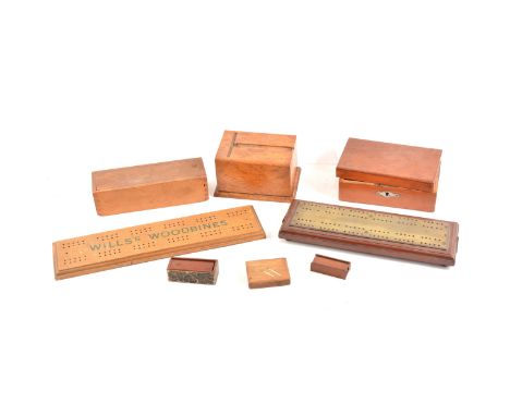 A brass-faced cribbage board, 26cm; an advertising cribbage board, Wills's Woodbines; a bone-faced dominoes, miniature domino