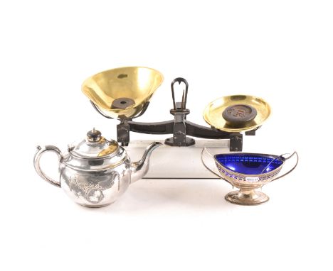 A set of Avery balance scales, brass pans, with some weights, width 40cm; Britannia metal teapot; and a plated sugar basket.