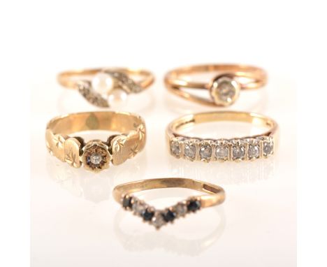 Five gemset rings, two illusion set diamond solitaires in 9 carat gold mounts, ring sizes K and N, a seven stone diamond half