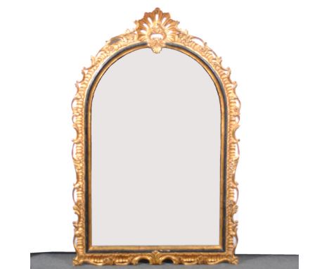 A reproduction gilt overmantel mirror, arched bevelled plate, width 97cm, height 149cm.