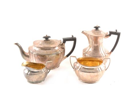 Silver four-piece tea set teaset, Henry Stratford Ltd, Sheffield 1915, oval form, including a presentation teapot, ebonised h