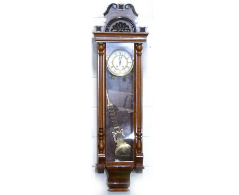A walnut cased Vienna wall clock, double weight driven movement, 148cm.