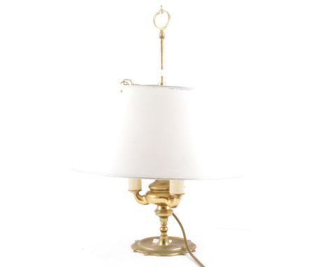 A brass boulette table lamp with telescopic adjustable shade, 51cm overall.