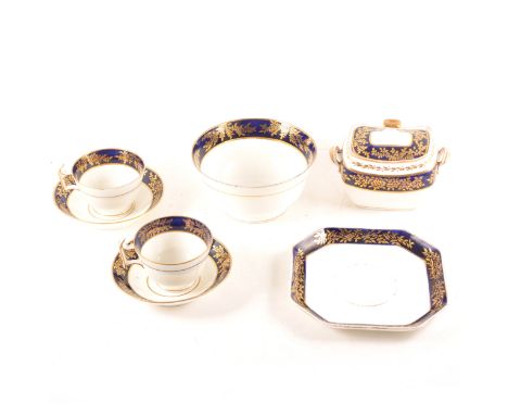 Spode part teaset, early 19th Century, banded in blue and gilt, comprising sucrier, width 14cm, slop bowl, stand, six various