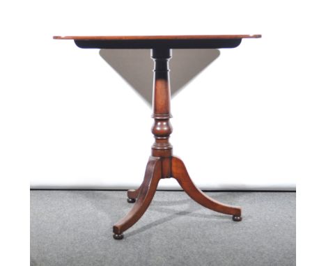 A Victorian mahogany tripod table, rectangular tilt-top, ringed column, tripod legs, diameter 53cm, height 73cm.