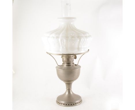 A steel oil lamp, large moulded opaque glass shade (damages), fitment stamped 'Famos' and 'British Made', height including ch