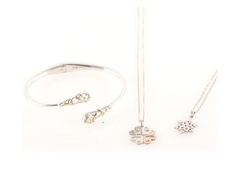 Clogau - a silver 12mm snowflake pendant and a 16mm heart pendant both with gold embellishment, the heart having Swarovski cr