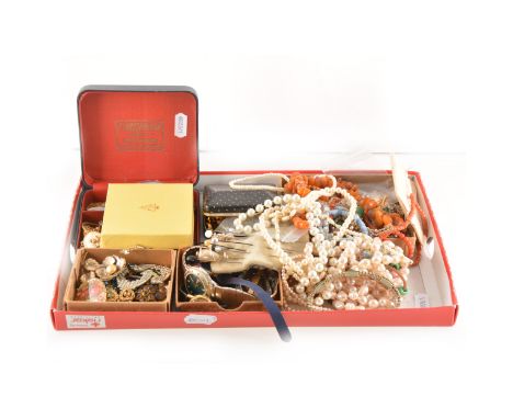 A collection of vintage costume jewellery, bead necklaces, paste brooches, gilt metal jewellery, a Kigu compact, hat pins.