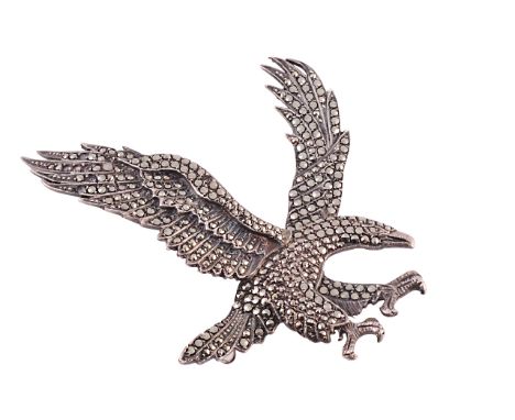 Three silver and marcasite brooches, the first depicting a an eagle in flight set throughout with graduating marcasite highli