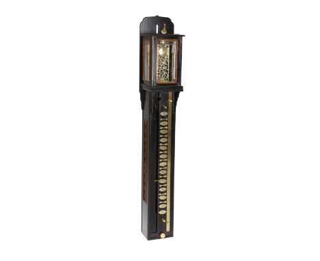 A Japanese pillar clock, c. 1890, the pillar shaped case with glazed hood, striking skeleton movement with foliate pierced pl