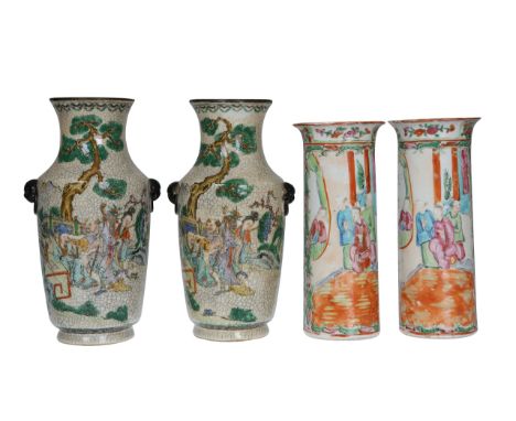 A pair of Chinese Famille Rose vases, the cylindrical bodies painted with figures, 20.5cm; together with a pair of Chinese cr