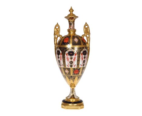 A Royal Crown Derby Imari vase, the two-handled ovoid body with square pedestal base and fixed "cover", decorated to pattern 