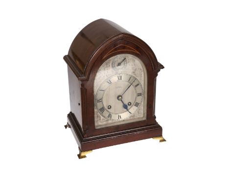 A Georgian style mahogany mantel clock, signed Mason, Middlesbrough, with lancet top, the engraved steel dial with Roman chap