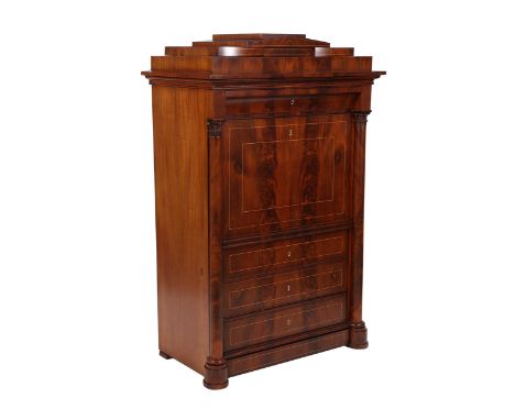 A Continental mahogany secretaire abbatant, 19th Century, the stepped architectural top over a shaped frieze drawer above a f