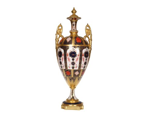 A large Royal Crown Derby Imari vase, the two-handled ovoid body with square pedestal base and fixed "cover", decorated to pa