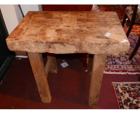 A French rustic work bench, on square legs joined by stretchers, H.75 W.79 D.50cm, missing section to top 