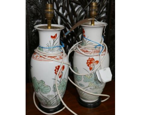 A pair of Chinese ceramic tables lamps with floral and bird decoration, H.40cm (2) 