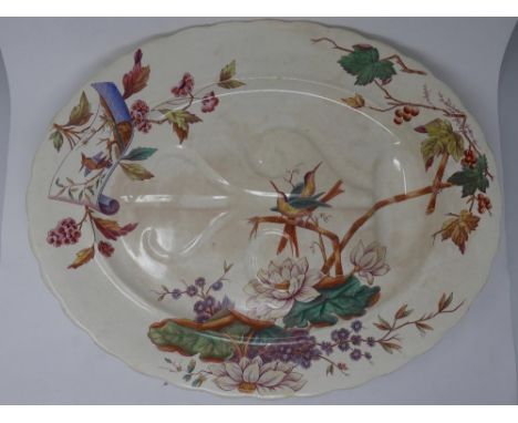 A Victorian Davenport ceramic meat platter, decorated with birds, 54x43cm 