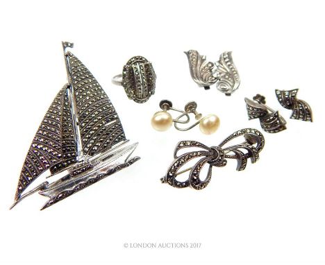 A collection of vintage silver and marcasite jewellery items to include a large, vintage, silver and marcasite sailing-boat b