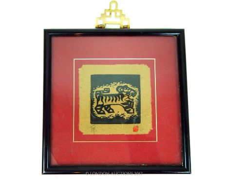 A Chinese woodblock print of a tiger, signed in pencil and stamped, sight size 12 x 12cm.