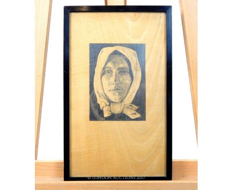 Unattributed, A striking portrait of a woman's face in pencil on wood, black framed and glazed, 20th century, Sight size: 37 