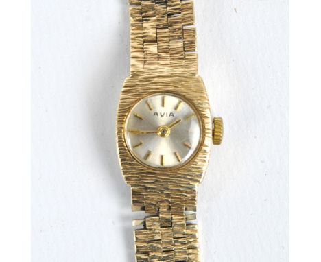AVIA; a 1970s 9ct yellow gold manual wind lady's wristwatch, the circular dial set with baton numerals, on gold integral text