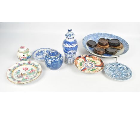 A group of various predominantly Chinese porcelain items to include a baluster vase painted in underglaze blue with architect