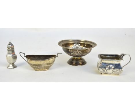 Four variously hallmarked silver items to include a circular footed bonbon dish with pierced sides, William Hair Haseler Ltd,