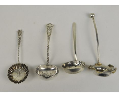 HENRY WILLIAMSON LTD; a Victorian hallmarked silver sifting spoon with twist decorated stem and floral engraved finial, Birmi