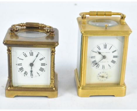 A late 19th century repeating carriage clock, the white enamel dial set with Roman numerals and inscribed August Regel Franku