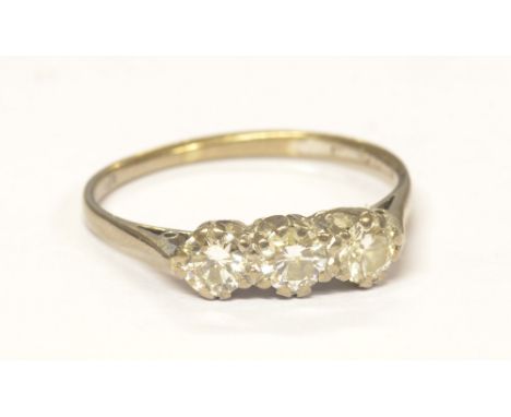An 18ct white gold three stone diamond ring, total approx 1cts, colour estimated F/I, clarity VS/SI, size U 1/2, approx 3.4g.