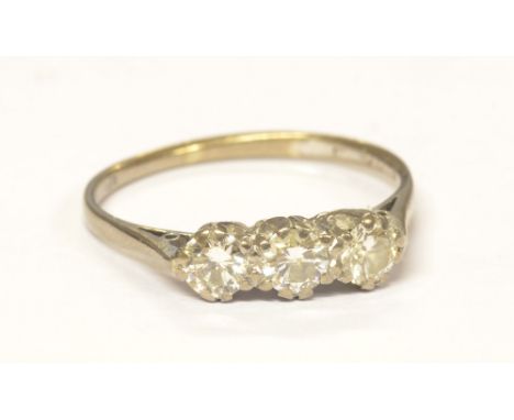 An 18ct white gold three stone diamond ring, total approx 1cts, colour estimated F/I, clarity VS/SI, size U 1/2, approx 3.4g.