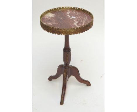 A reproduction French style tripod occasional table with marble and galleried top, height 57cm.