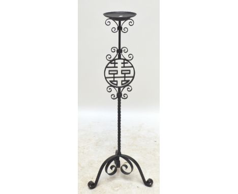 A modern painted wrought iron tripod stand decorated with a Chinese auspicious seal mark, height 112cm.  