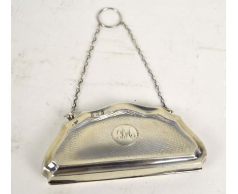 S M LEVI LTD (probably); a George V hallmarked silver purse with engine turned decoration, centred with a circular cartouche 