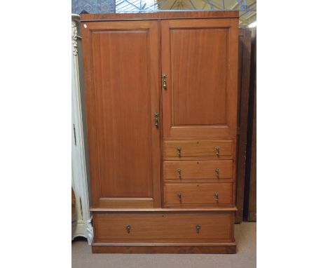 An Edwardian mahogany combination wardrobe. CONDITION REPORT: Lacking cornice, whole thing has been stripped and also re-hand