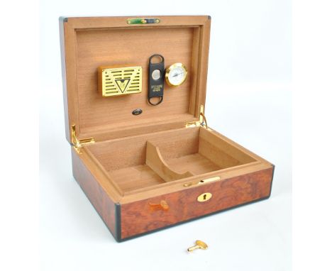 A modern Dunhill humidor with key, 28.5 x 22 x 10.5cm. CONDITION REPORT: There is no guarantee that this item is working, the