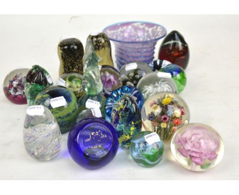 A collection of glass paperweights including Caithness 'Myriad', and 'Scallop' and a Mdina seahorse shaped example, also a Md