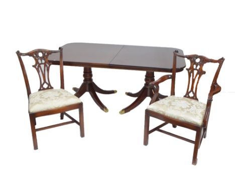 A reproduction mahogany D-end dining table and a set of fourteen Chippendale style chairs (15). CONDITION REPORT: Chair heigh