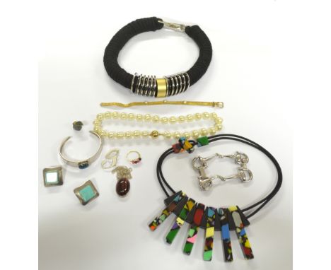 A mixed group of predominantly contemporary costume jewellery including a silver bracelet, a colourful moulded plastic neckla