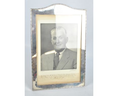 HAMILTON & CO; a large early to mid 20th century Indian Colonial silver rectangular frame with domed top engraved with coat o