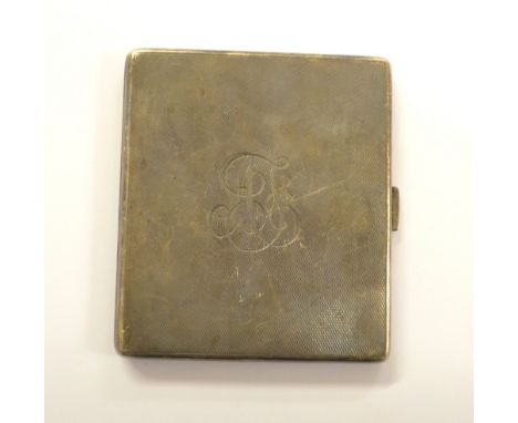 A George VI hallmarked silver cigarette case of rounded rectangular form with engraved initials to the front, Birmingham 1941